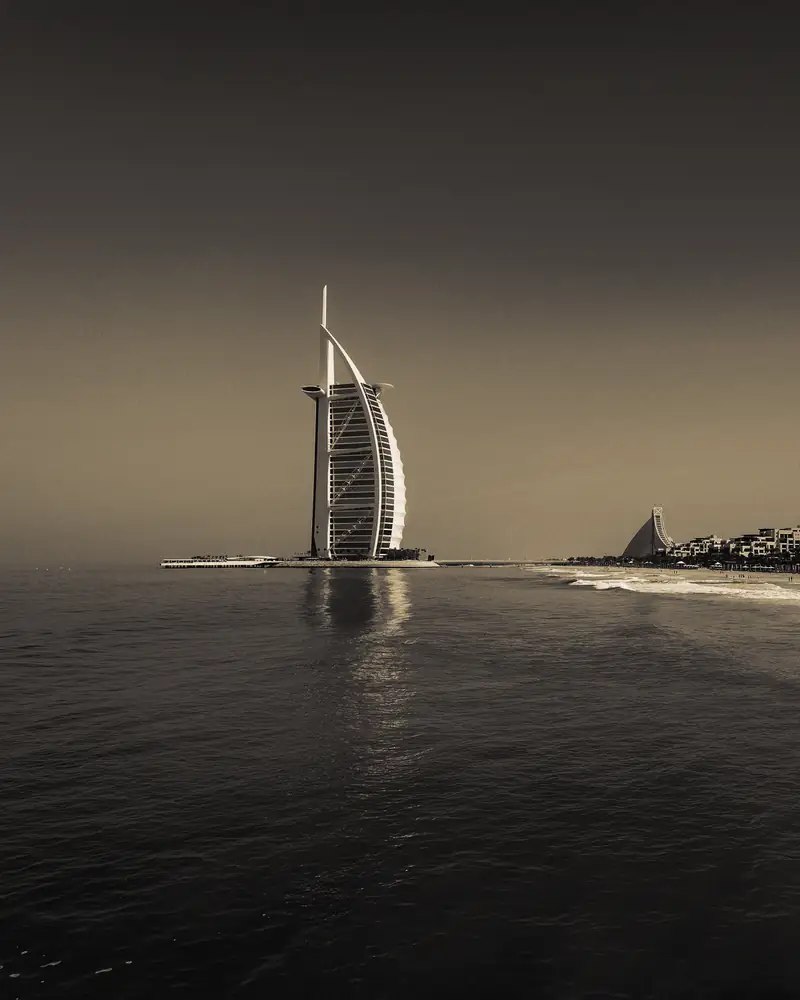 The Burj Al Arab hotel standing in the sea off Dubai